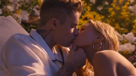 justin bieber and hailey baldwin put their love on display in pda filled video for 10 000 hours