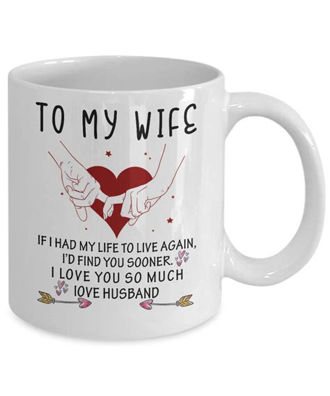 a white coffee mug with the words to my wife on it
