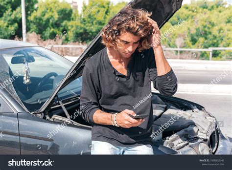 Young Caucasian Man Trying Repair Breakdown Stock Photo 1978802741