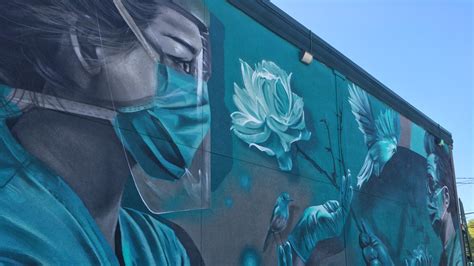 Local Artist Unveils Completed Tribute Mural For Healthcare Workers
