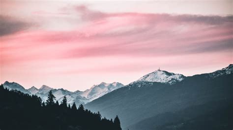 1366x768 Pink Sky Nature Beauty Mountains Snow 5k 1366x768