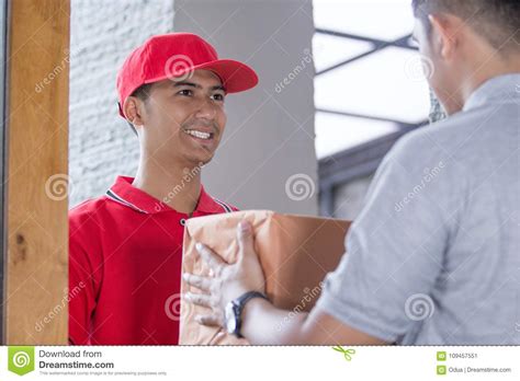 Delivery Man Delivering Box Stock Image Image Of Male Customer