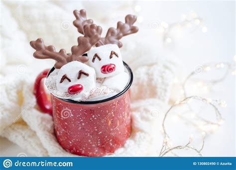 Hot Chocolate With Melted Marshmallow Snowman Stock Photo
