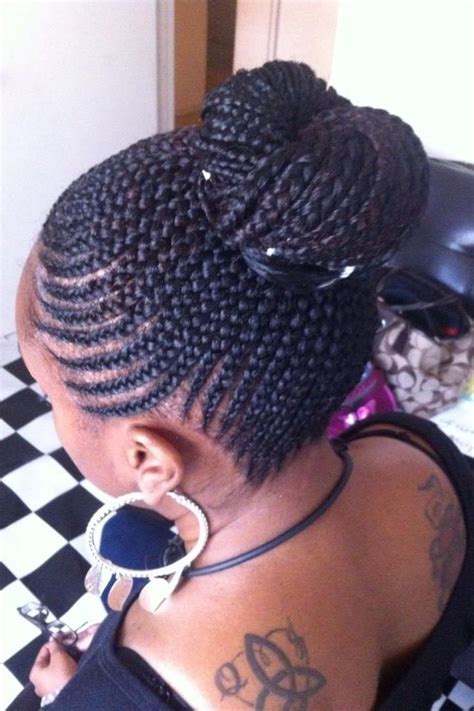 Take a look at the following styles and find a hairdo that wo. Beautiful Cornrow Bun - http://www.blackhairinformation ...