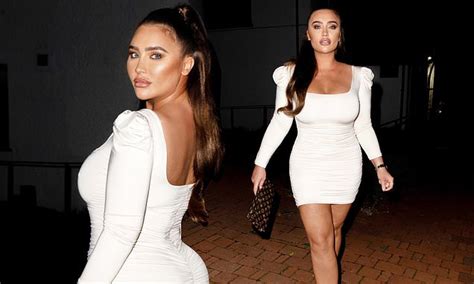Lauren Goodger Flaunts Her Jaw Dropping Curves In A Plunging White