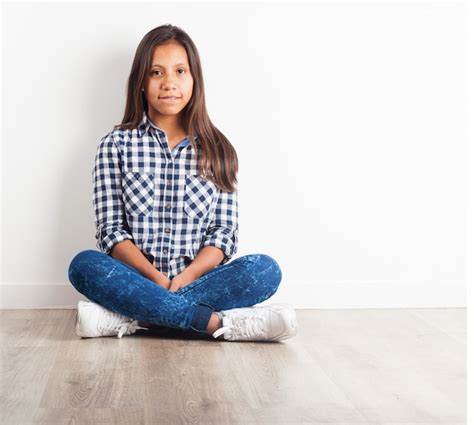 Free Photo Young Girl Sitting On The Floor