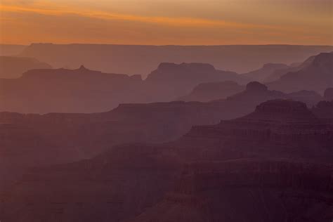 Hazy View Of Rock Formations At Arizonas Grand Canyon National Park At