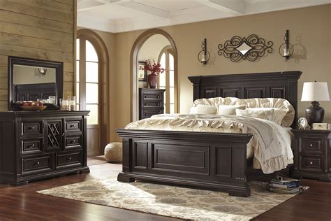 willenburg casual dark brown solid wood master bedroom set