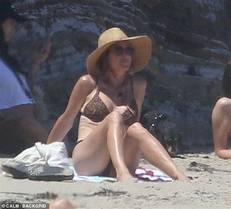 Kristen Wiig Shows Off Her Toned Bikini Body On The Beach In Malibu Before Giving Shirtless