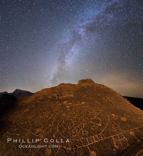 The Milky Way At Night Over Sky Rock Petroglyphs Photograph