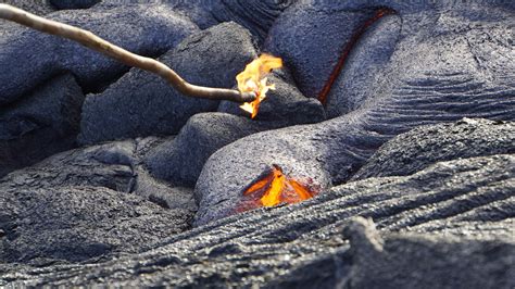 Poking Into Lava Kilauea Hawaii Volcanoes