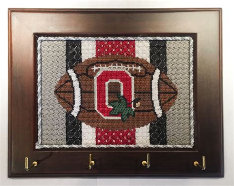 Sweepstakes community featuring a categorized, searchable directory of current online sweepstakes, contests, and giveaways. Needlepoint Ohio State Football Sports Buckeyes ...
