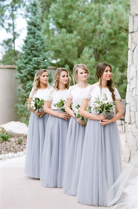 The Bride And Her Bridesmaids Are Standing Together