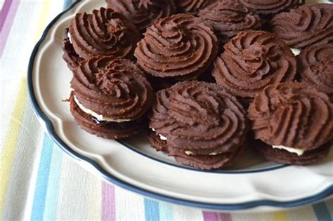 Chocolate Viennese Whirls With Vanilla Buttercream And Blackcurrant Jam Tin And Thyme Crinkle