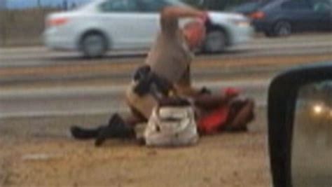 video shows cop punching woman on l a freeway