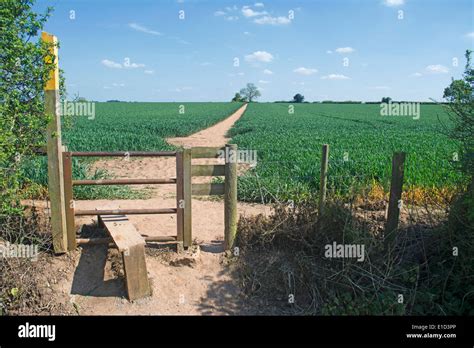 Country Style And A Countryside Footpath Through A Farmers Field