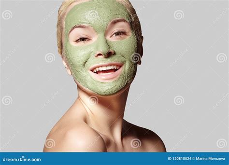 Beautiful Woman Applying Green Facial Mask Beauty Treatments Stock