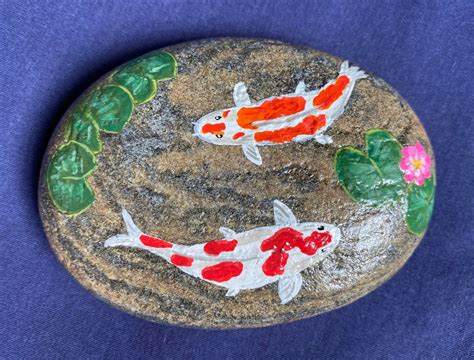 Unique And Handmade Painted Rocks Two White And Orange Koi Fish