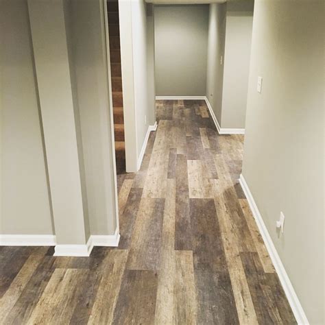 We installed it ourselves, and here's a review of how it's held up 1 year later. Another basement project finished in Avon. Love this new Lifeproof flooring!! 100% waterproof ...