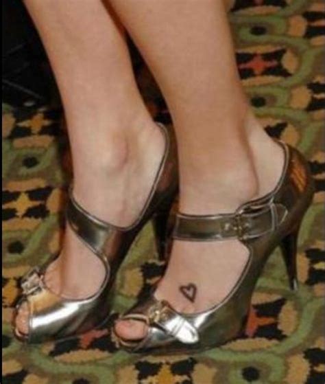 Getting hand tattoos is a matter of making bold and rebellious style statement. Want this tattoo!!:) | Taylor swift tattoo, Heart foot tattoos, Foot tattoo
