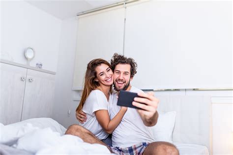 Morning Selfie Young Happy Beautiful Couple On The Bed Making Self