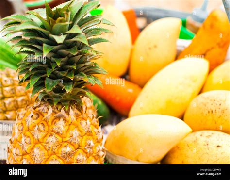 Selling Tropical Fruits And Vegetables At Market Close Up Pineapple