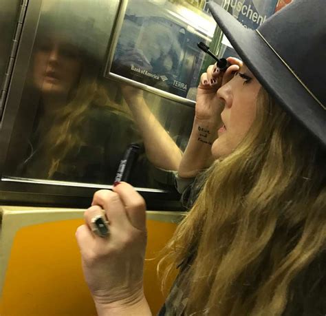 Drew Barrymore Masters Applying Makeup While On Subway