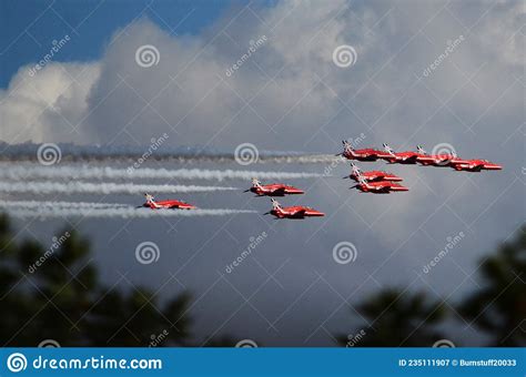 The Red Arrows Royal Air Force Aerobatic Team Flying In Formation