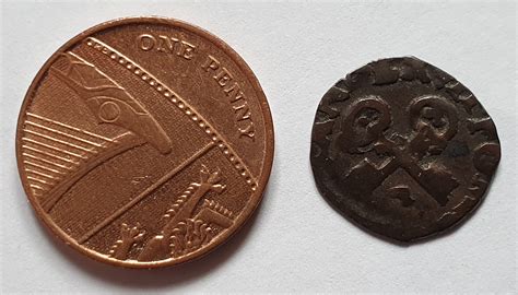 Many collections have good coins (without mechanical damage), but with dirt or dark spots. Hammered bronze coin to i.d solved - Numista
