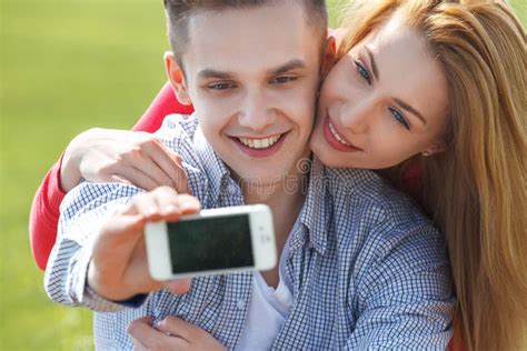 Couples With Phone Taking Self Portrait At The Park Stock Image Image