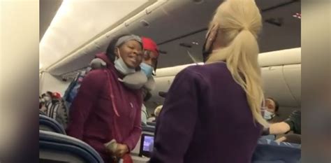 Video Woman Kicked Off Plane After Hitting Flight Attendant