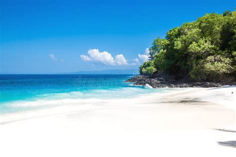 Tropical White Sand Beach And Ocean With Crystal Water In Bali Stock