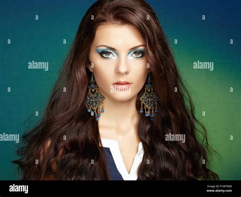 Portrait Of Beautiful Brunette Woman With Earring Perfect Makeup Fashion Photo Stock Photo Alamy