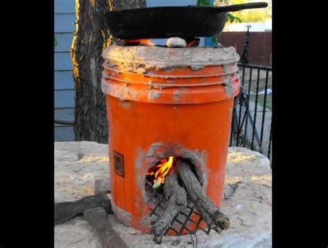 Rocket Stove Made From 5 Gallon Bucket 2 Full Bottles Of 2 Liters Of