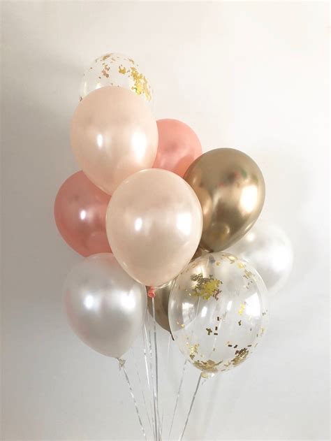 Each pack has (2) rose gold (2) pearl light peach (2) pearl white and (2) clear with gold polka dots 11 latex balloons. Rose Gold, Chrome Gold, Peach White, Gold Confetti Balloon ...