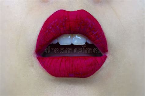 sensual and mouth with red lipstick white teeth biting tongue pose stock image image of