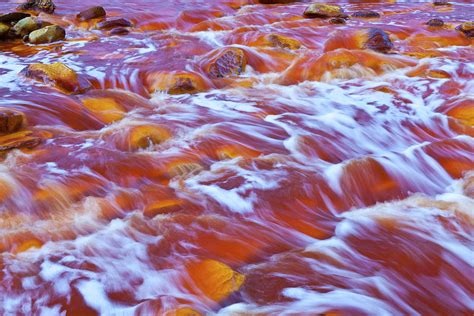 Red Waters Of The Rio Tinto Coloured By Dissolved Iron Spain