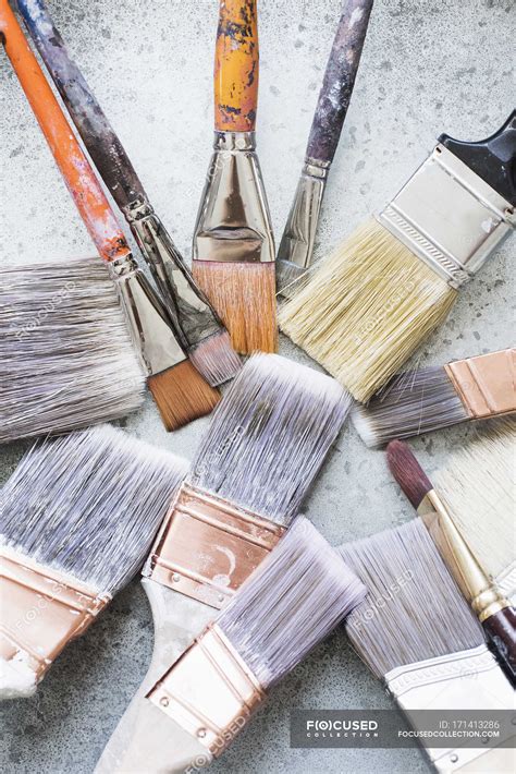 Closeup Shot Of Still Life Of Paintbrushes On Rustic Surface