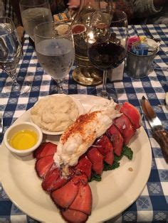 Crispy young hearts of romaine lettuce, cut in half, soaked in olive oil and lemon juice slightly grilled, served with grilled veggies and fresh basil. Angus Barn: Food