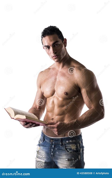 Shirtless Muscular Man Reading Big Book Stock Photography