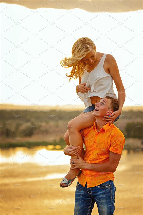Man Carrying Girl On Piggyback High Quality People Images ~ Creative