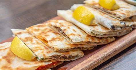 Gözleme is a traditional savory Turkish homemade flatbread which has