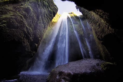 Icelandic Waterfall Cave Photograph By Jack Nevitt Fine Art America