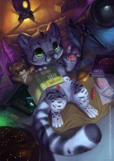 A Cat That Is Laying Down With Some Books