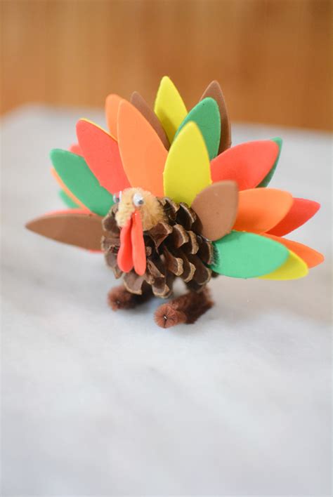 Thanksgiving Crafts For Kids How To Make A Pinecone Turkey Mommys
