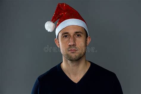 Photo Of Adult Serious Man In Christmas Hat Stock Image Image Of Claus Beauty 49577367