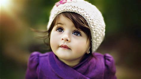 Cute Adorable Girl Baby Is Looking Up Wearing Purple Dress HD Cute 