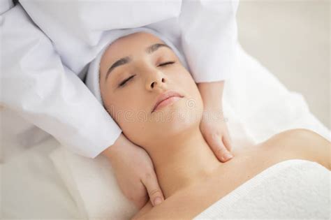 Beautician Doctor Doing Neck Massage To Young Indian Woman In Spa Salon Stock Image Image Of