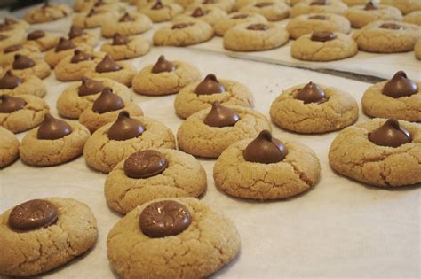 Once it's out of the oven, place and press the hershey kisses on top immediately. Recipe for Hershey Kiss Peanut Butter Cookies ...