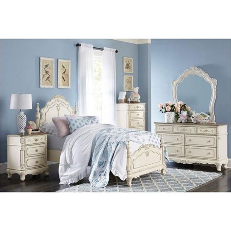 The victorian styling incorporates floral motif hardware and traditional carving details that will create the feeling of a room worthy of a fairy tale. Cinderella Youth Panel Bedroom Set (Antique White) by ...